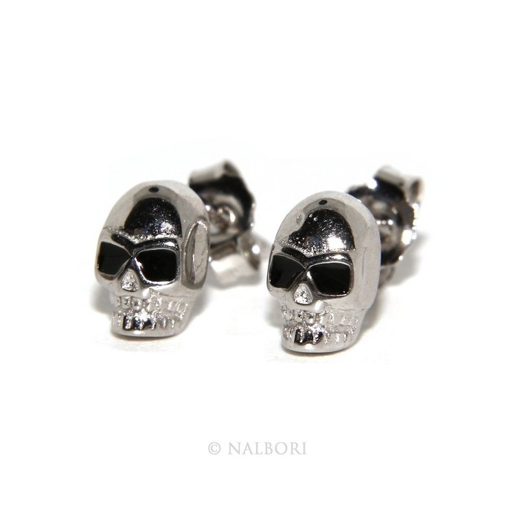 NLB|925: pair of tiny woman Man skulls casting earrings