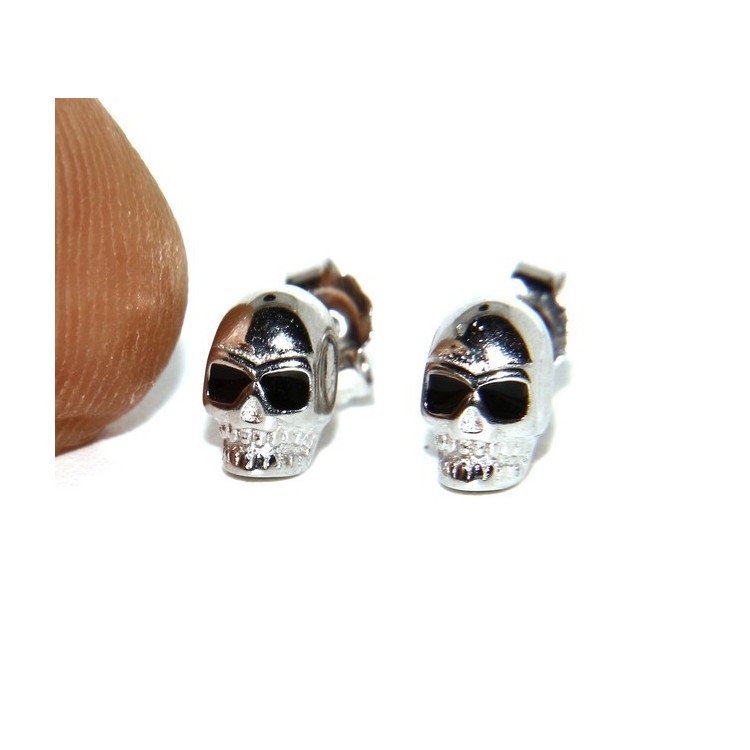 NLB|925: pair of tiny woman Man skulls casting earrings