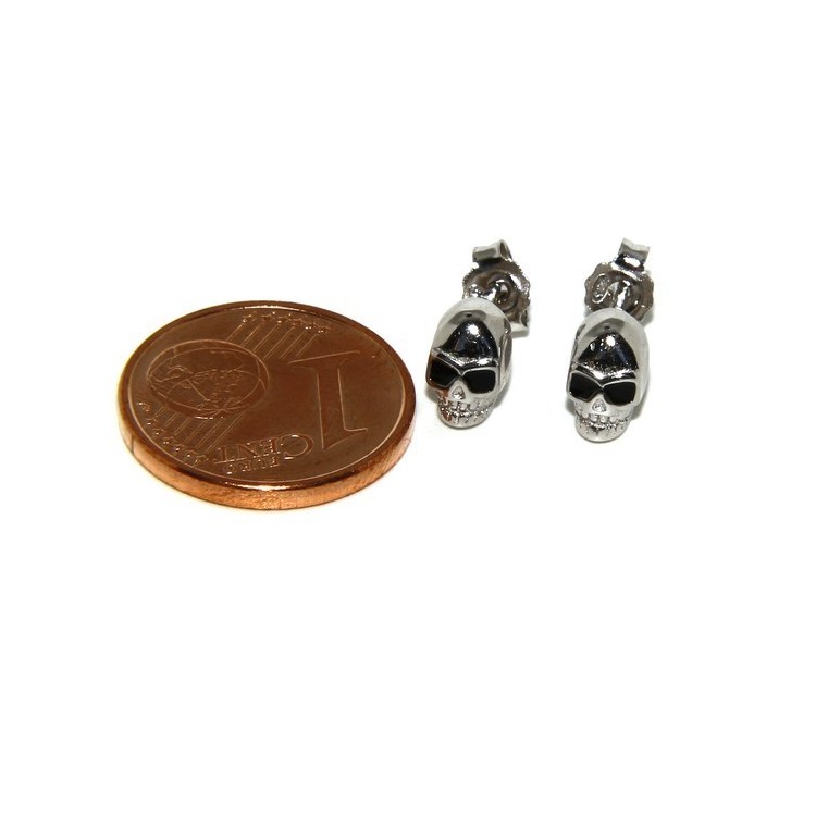 NLB|925: pair of tiny woman Man skulls casting earrings