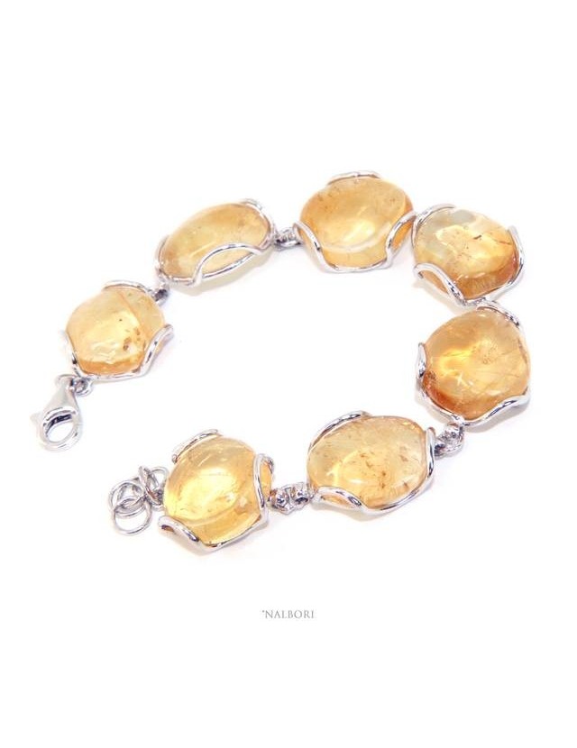 1000/5000
Woman bracelet in 925 silver and natural yellow citrine stones 30 gr